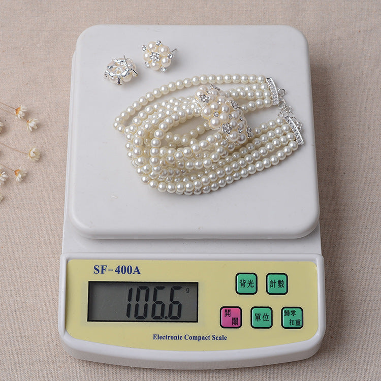 Bridal chain with luxury pearls - flower necklace & earring set